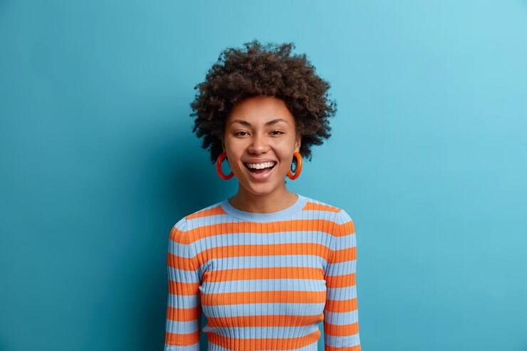 Free Photo close up portrait of an attractive young woman isolated