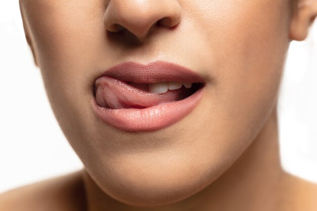 Close-up portrait of beautiful Jewish woman isolated on white studio.