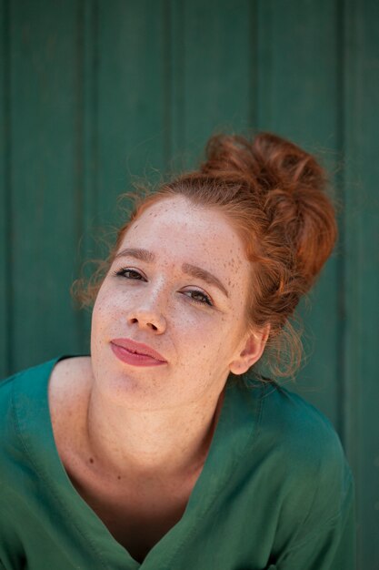 Close-up portrait of beautiful redhead woman