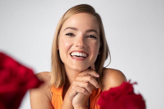 Free photo close up portrait of beautiful woman with flowers