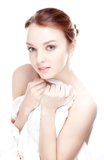 Close up portrait of beautiful young female. Isolated on white background