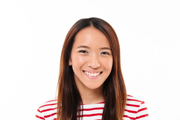 Close up portrait of a cheerful young asian girl