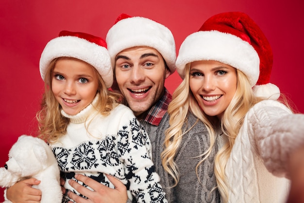 Close up portrait of a cute family with a child