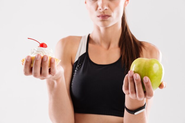 Close up portrait of a doubting sportswoman