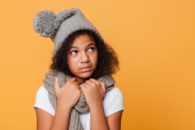 Close up portrait of a frozen afro american girl