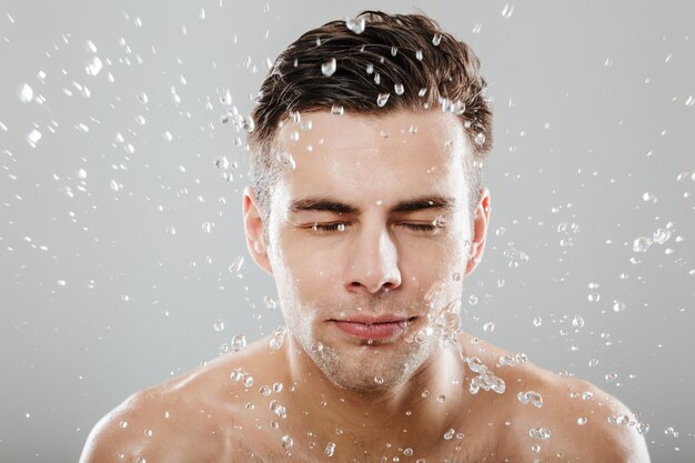 Close up portrait of a handsome half naked man