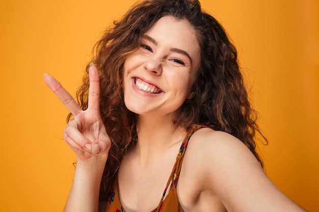 Premium Photo Close Up Portrait Of A Happy Curly Haired Girl