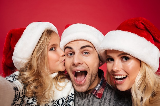 Close up portrait of a joyful family with a child