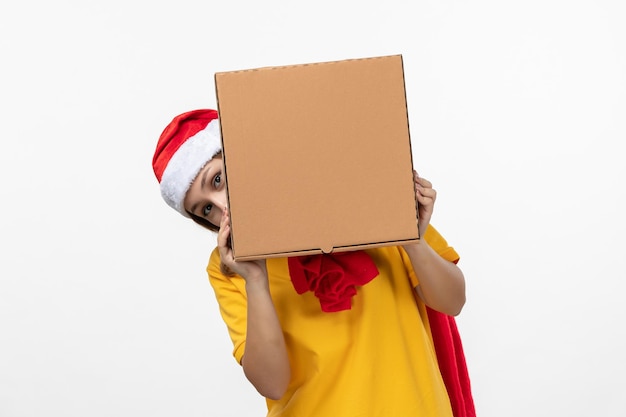 Close up portrait of male courier wearing Santa hat isolated