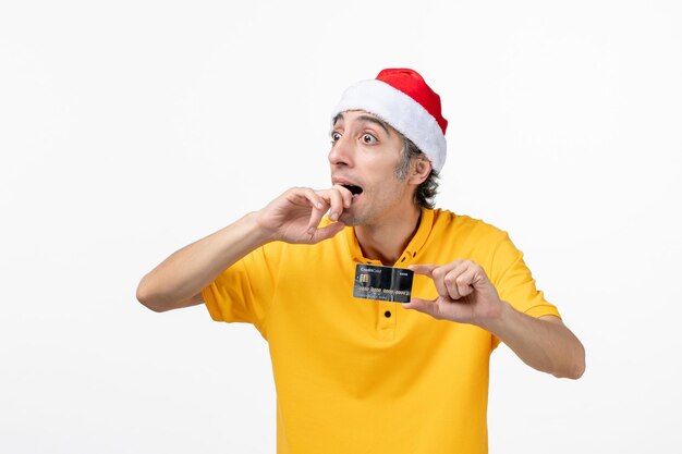 Close up portrait of male courier wearing Santa hat isolated