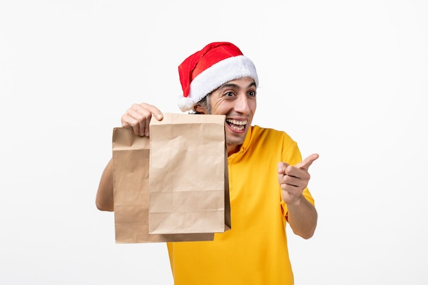 Close up portrait of male courier wearing Santa hat isolated