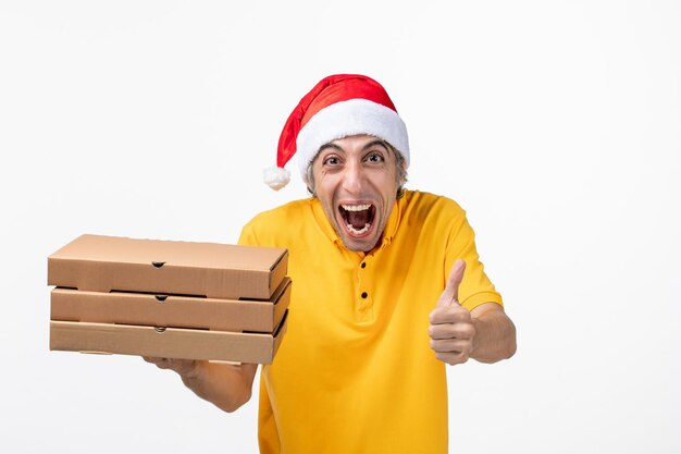 Close up portrait of male courier wearing Santa hat isolated