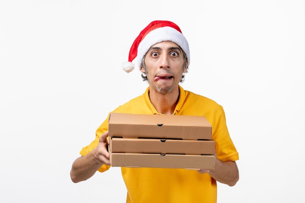 Close up portrait of male courier wearing Santa hat isolated