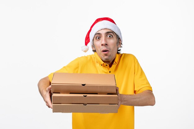 Close up portrait of male courier wearing Santa hat isolated