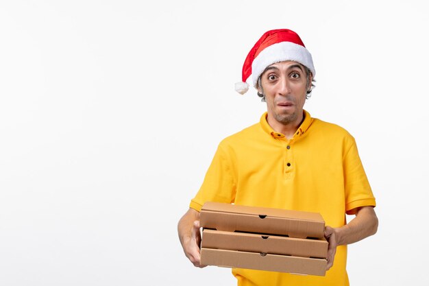 Close up portrait of male courier wearing Santa hat isolated