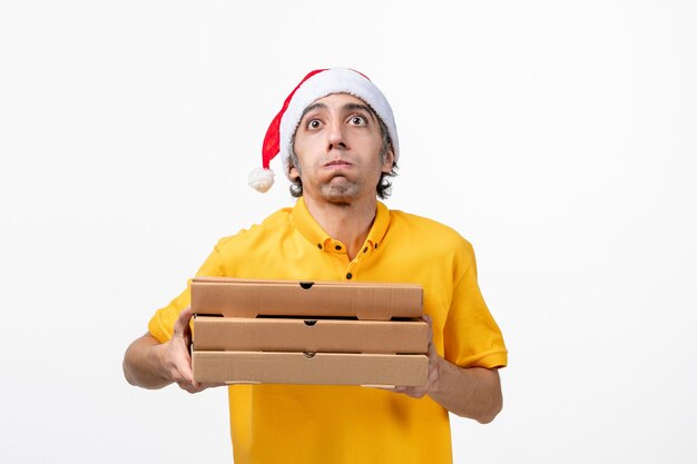 Close up portrait of male courier wearing Santa hat isolated