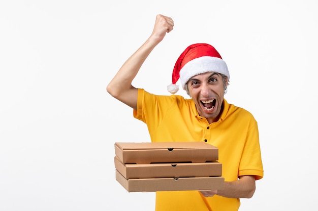 Close up portrait of male courier wearing santa hat isolated