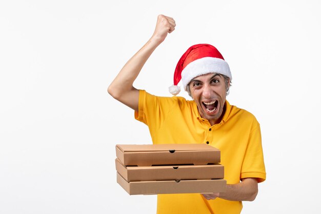 Close up portrait of male courier wearing Santa hat isolated