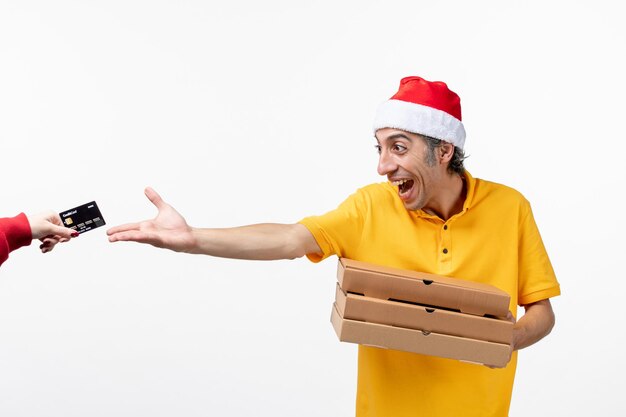 Close up portrait of male courier wearing Santa hat isolated