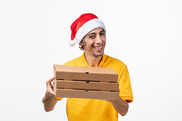 Close up portrait of male courier wearing Santa hat isolated