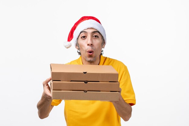 Close up portrait of male courier wearing Santa hat isolated