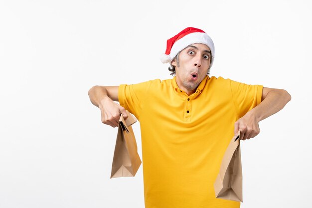 Close up portrait of male courier wearing Santa hat isolated