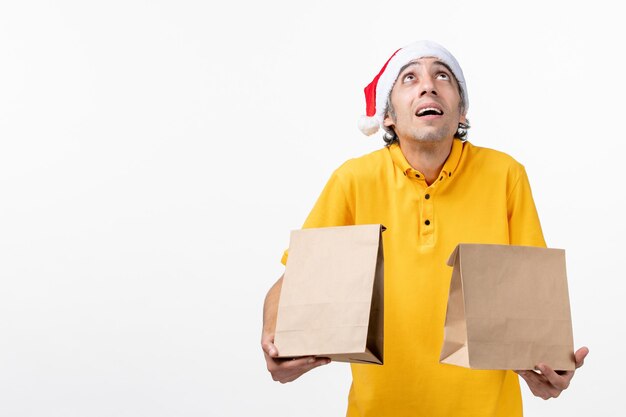 Close up portrait of male courier wearing Santa hat isolated