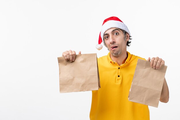 Close up portrait of male courier wearing Santa hat isolated