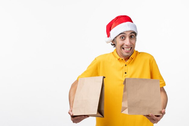 Close up portrait of male courier wearing Santa hat isolated