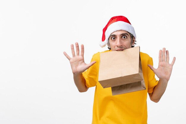 Close up portrait of male courier wearing Santa hat isolated