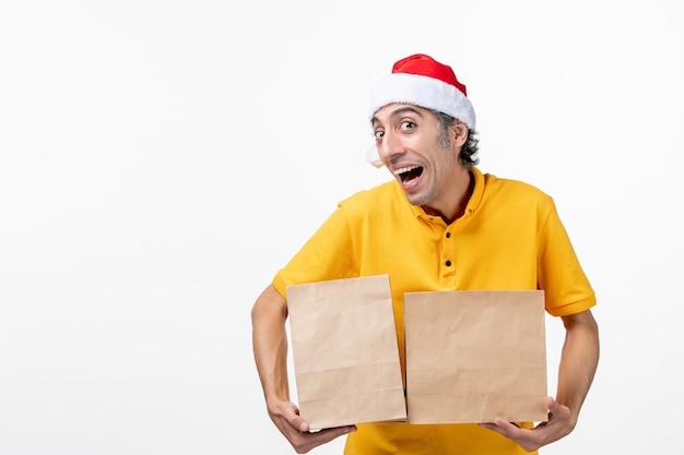 Close up portrait of male courier wearing Santa hat isolated