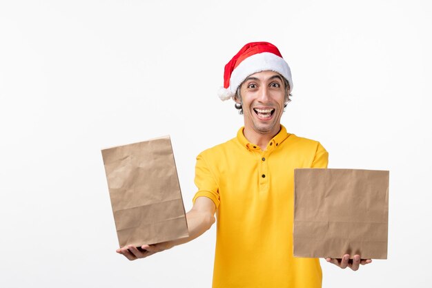 Close up portrait of male courier wearing Santa hat isolated