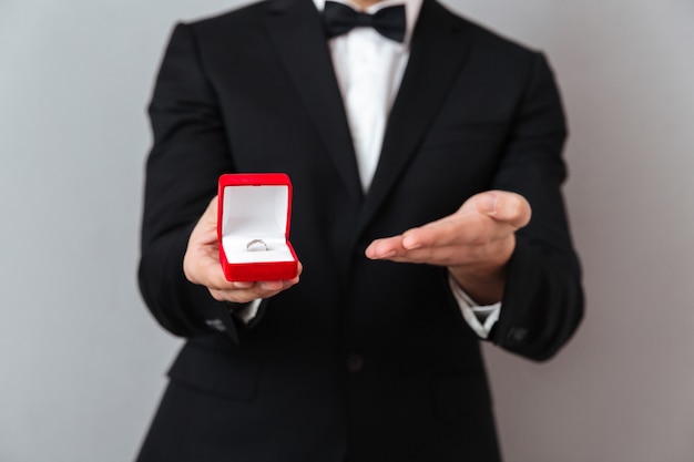 Close up portrait of a man dressed in tuxedo