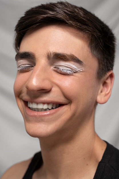 Close up portrait of person wearing make up liner