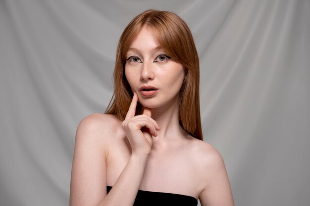 Close up portrait of person wearing make up liner