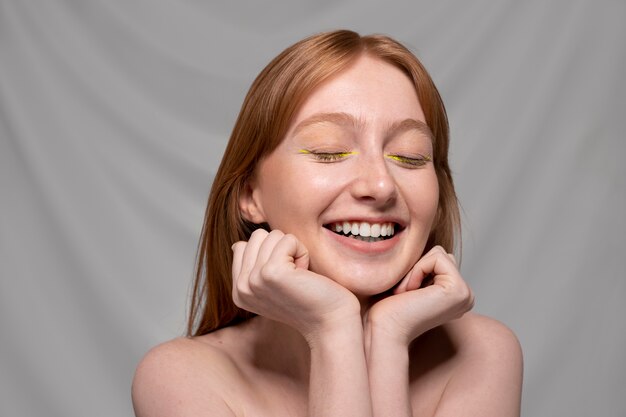 Close up portrait of person wearing make up liner