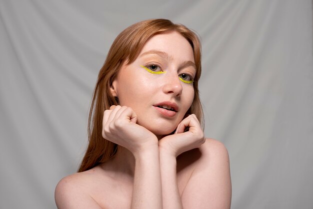 Close up portrait of person wearing make up liner