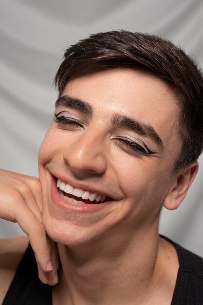 Close up portrait of person wearing make up liner