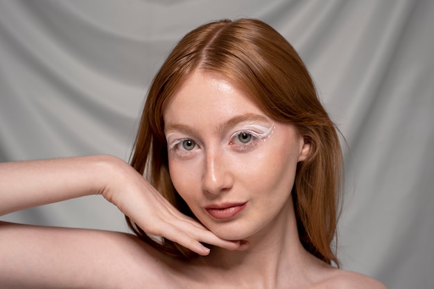 Free photo close up portrait of person wearing make up liner