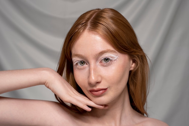 Close up portrait of person wearing make up liner