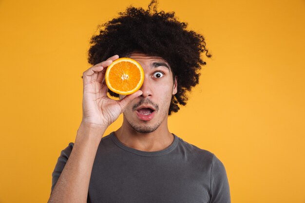 Close up portrait of a shocked young african man