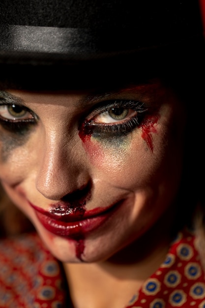 Close-up portrait of smiley crazy halloween clown