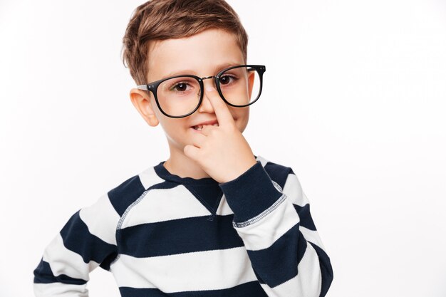 Close up portrait of a smiling cute little kid in eyeglasses