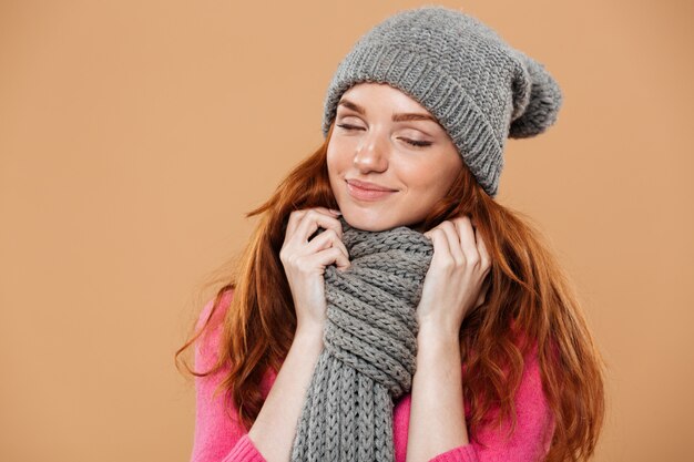 Close up portrait of a smiling lovely redhead girl