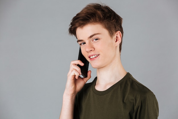 Close up portrait of a smiling male teenager