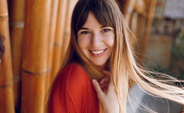 Close up portrait of smiling woman with white candid smile