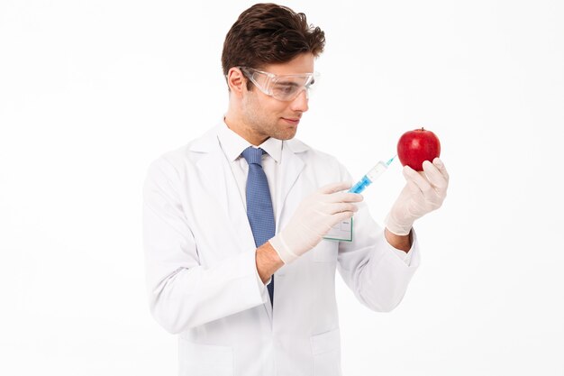 Close up portrait of a smiling young male doctor