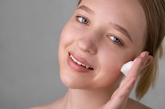 Close up portrait of woman with hydrated skin