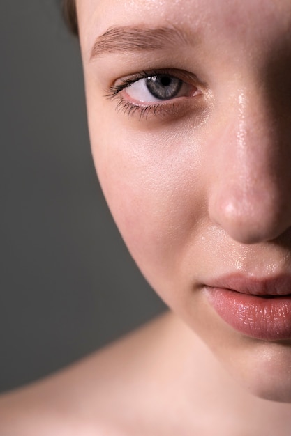 Close up portrait of woman with hydrated skin