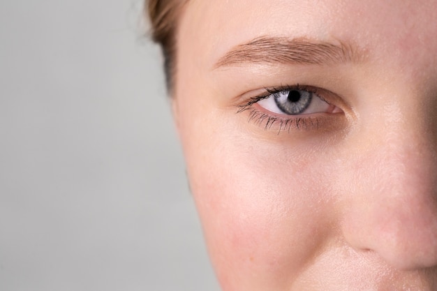 Close up portrait of woman with hydrated skin